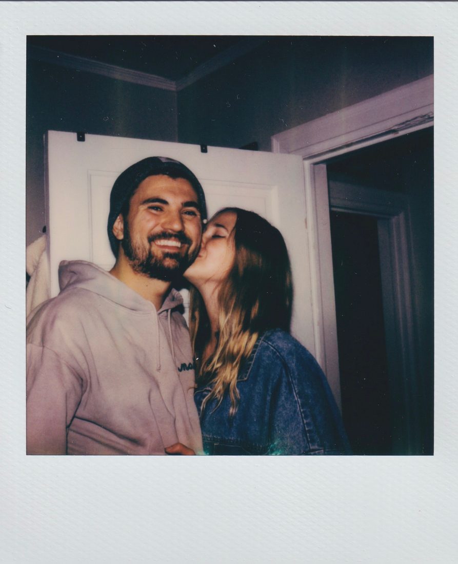 Mary Catherine kissing Thomas — a Polaroid moment